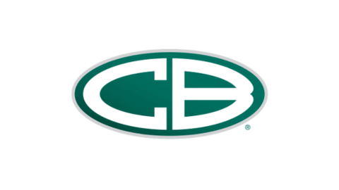 Christian Brothers Automotive technician participating in hands-on technical training while collaborating with peers in a culture-focused franchise learning environment designed to improve performance, leadership, and customer service.